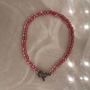 Clear pink beaded bracelet